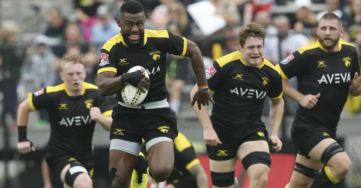 Houston SaberCats Alex Elkins (14) runs forward and scores a try during the first half of the home opener of the Major League Rugby game against New Orleans Gold at Dyer Stadium on Saturday, April 21, 2018, in downtown Houston. ( Yi-Chin Lee / Houston Chronicle )