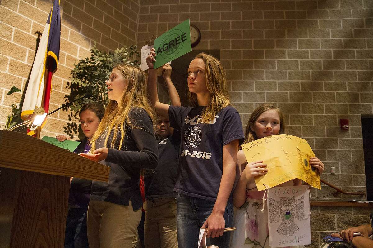 Students from Hill Country Montissori School speak in opposition of a concrete batch plant by Vulcan Materials at a public hearing held by the Texas Commission on Environmental Quality, Thursday, April 19, 2018 at Boerne Middle School North.