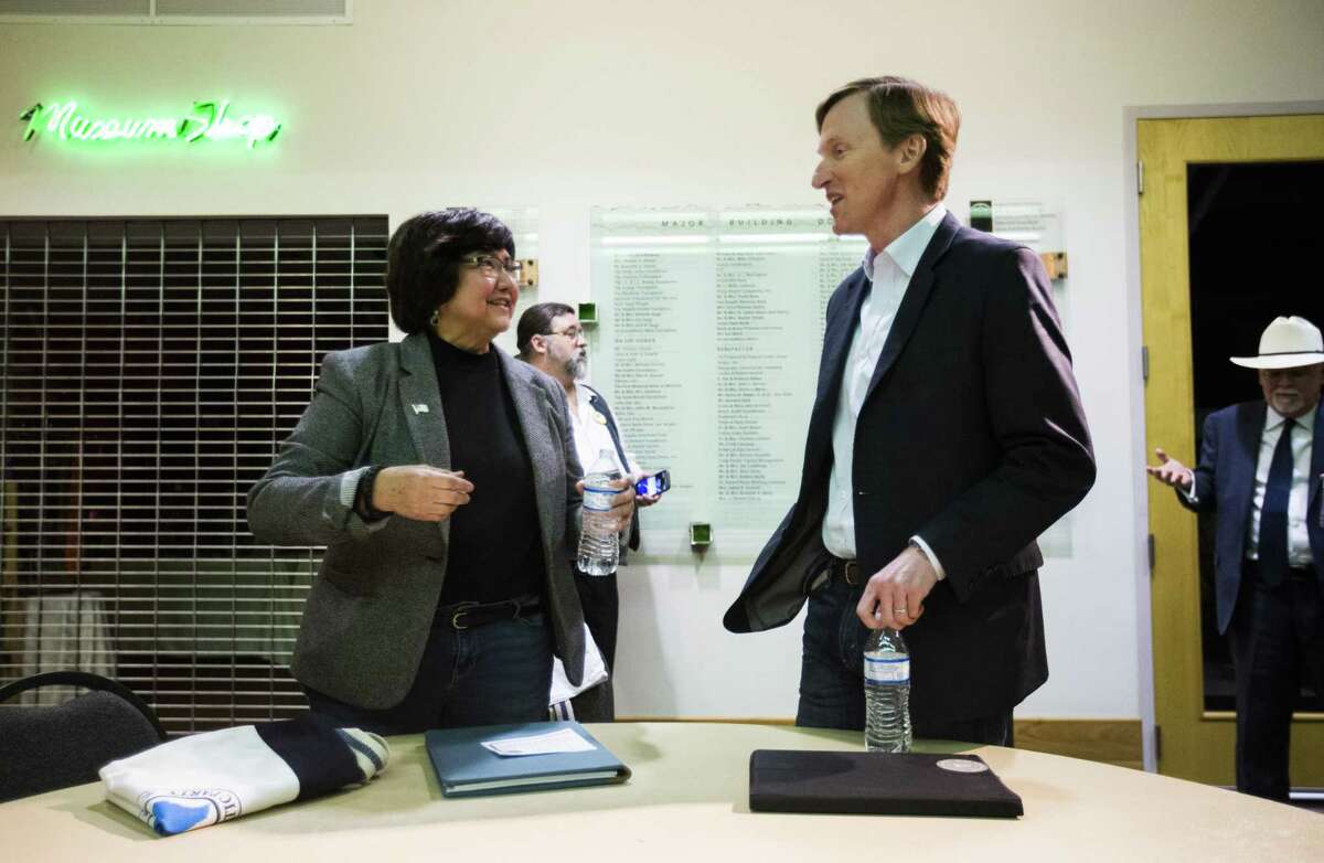 Gubernatorial candidates Lupe Valdez, left, and Andrew White, right, greet each other before a democratic gubernatorial candidate forum hosted by Tom Green County Democratic Club on Monday, January 8, 2018 at the San Angelo Museum of Fine Arts in San Angelo, Texas. (Ashley Landis/The Dallas Morning News)