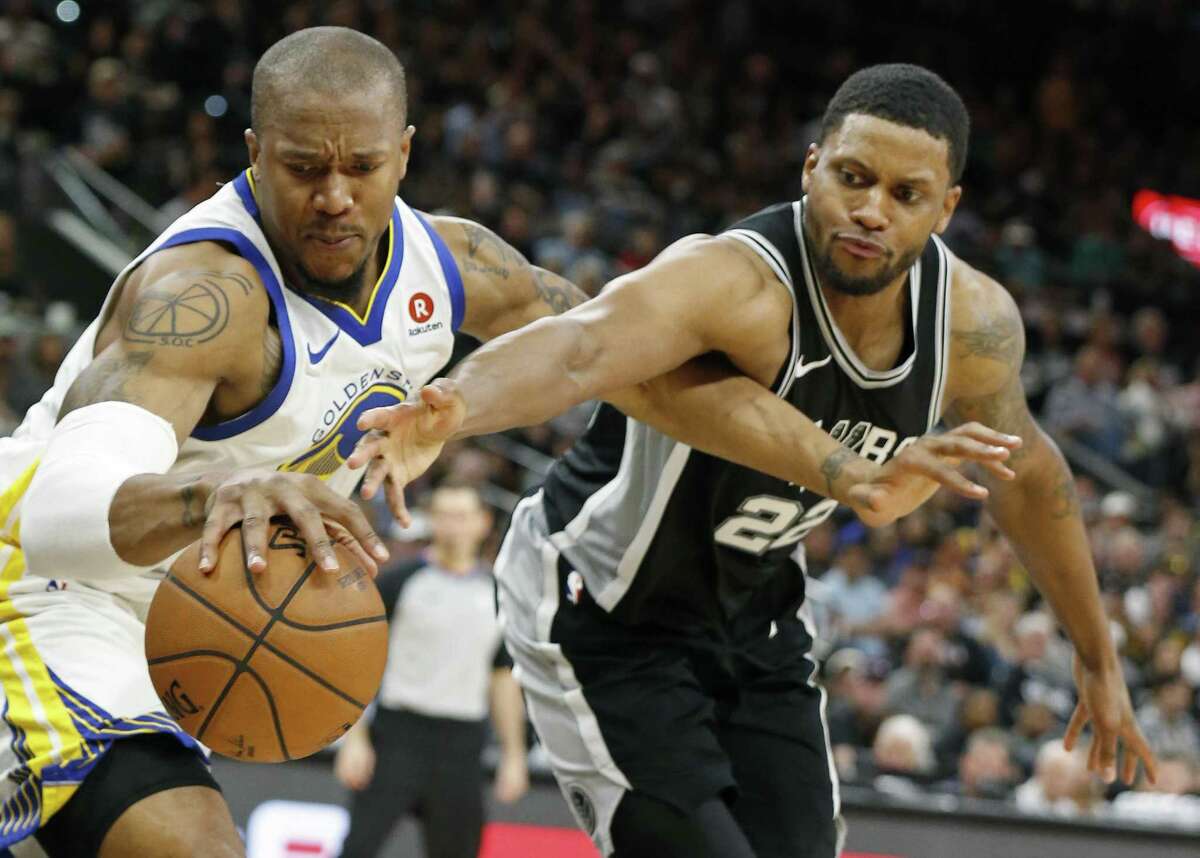 Golden State Warriors forward David West (3) and San Antonio Spurs forward Rudy Gay (22) grab for a loose ball during second half action of Game 4 Sunday April 22, 2018 at the AT&T Center. The Spurs won 103-90.