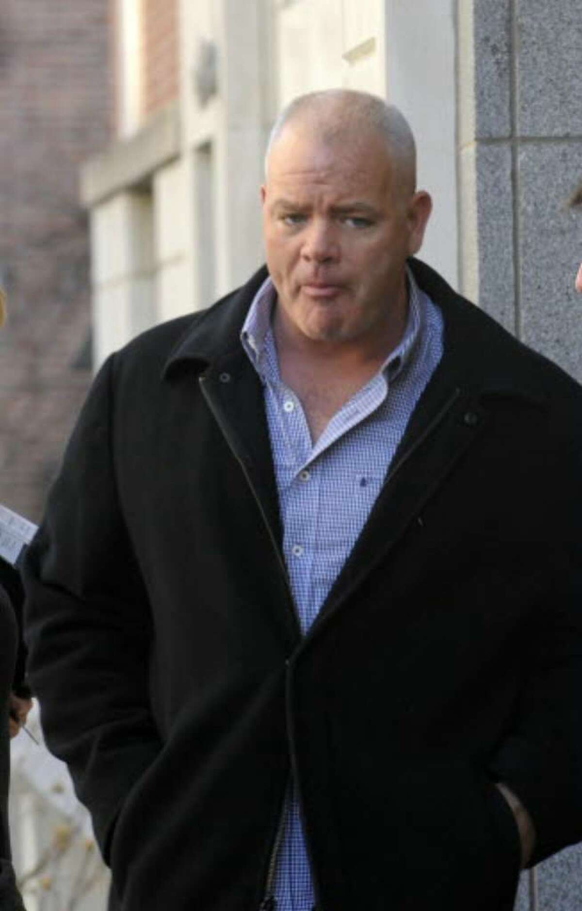 Bar owner charged in connection with reporter's beating