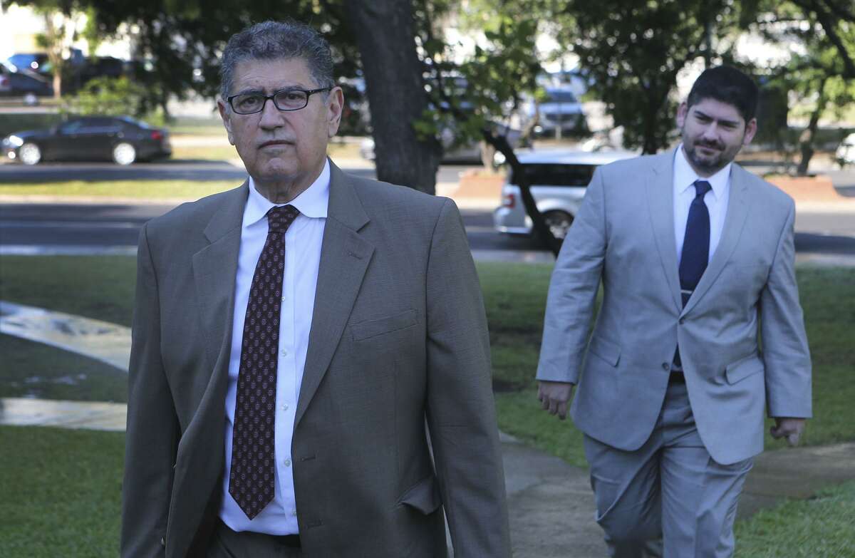 Former Mexican federal prosecutor and director of intelligence for the Mexican state of Jalisco Sergio Adame Ochoa Sr.,66, (left) and his son Sergio Adame Ochoa, Jr. (right) walk to the John H. Wood, Jr. Federal Courthouse Monday April 23, 2018. The senior Adame Ochoa is being sentenced for lying to a bank and the junior Adame Ochoa entered a guilty plea on behalf of Allen Land LP and Allen Management LLC to a single count of conspiracy to launder money.