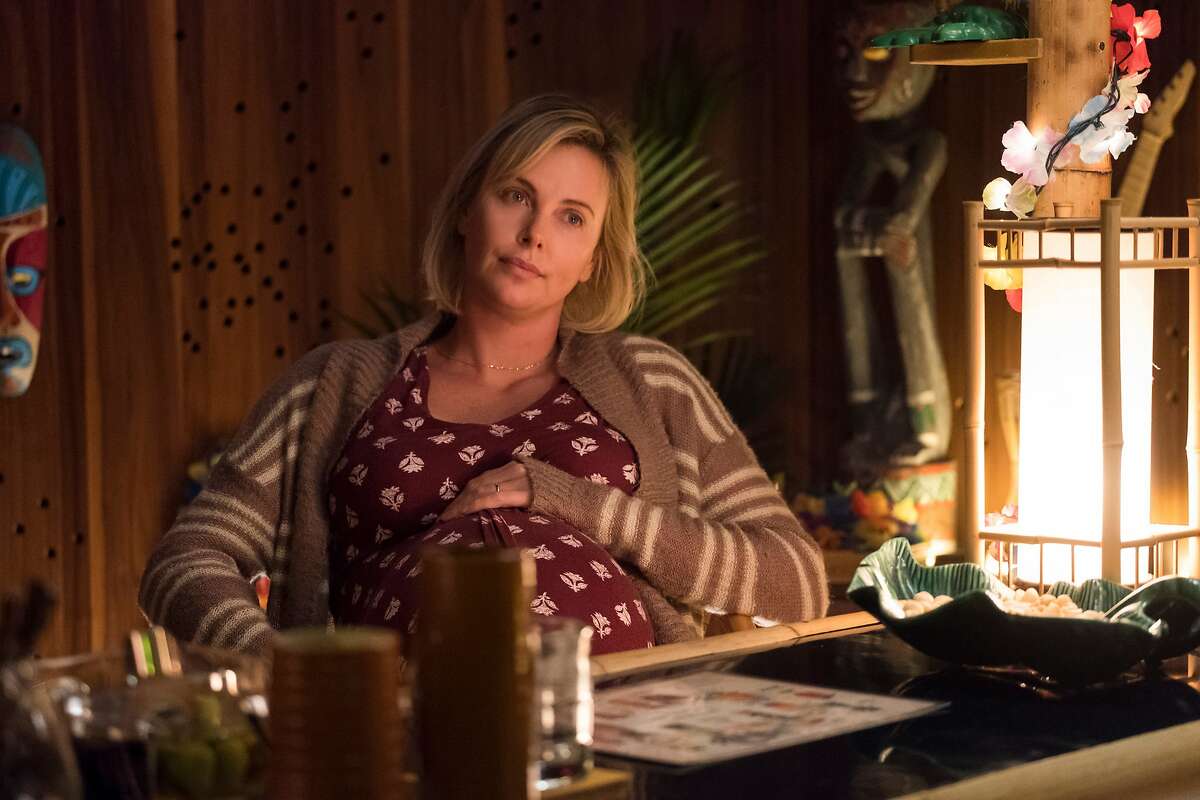 This image released by Focus Features shows Charlize Theron in a scene from "Tully," in theaters on May 4. (Kimberly French/Focus Features via AP)