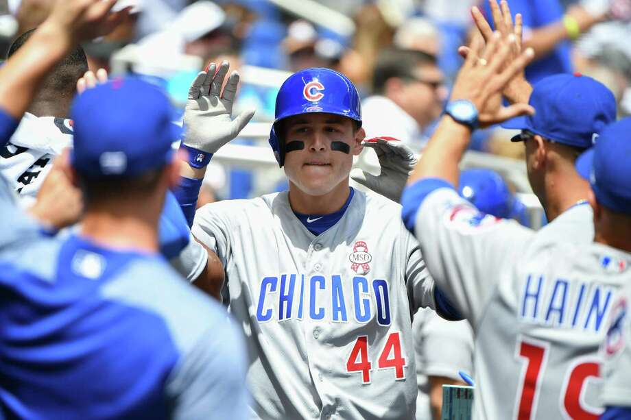 MIAMI, FL - MARCH 29: Anthony Rizzo #44 of the Chicago Cubs celebrates a  home run in the dugout in the second inning during Opening Day against Miami Marlins at Marlins Park on March 29, 2018 in Miami, Florida. (Photo by Mark Brown/Getty Images) Photo: Mark Brown / 2018 Getty Images