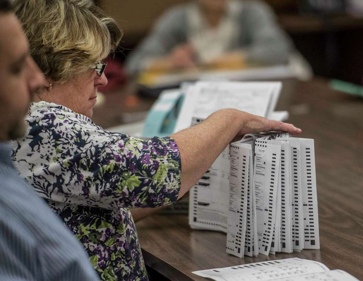 The recount of absentee ballots in the City of Saratoga election continues as a closer look is made of the City Charter vote and the race for the Public Safety Commissioner Tuesday Nov. 14, 2017 at the Saratoga County Board of Elections offices in Ballston Spa, N.Y. (Skip Dickstein/ Times Union)