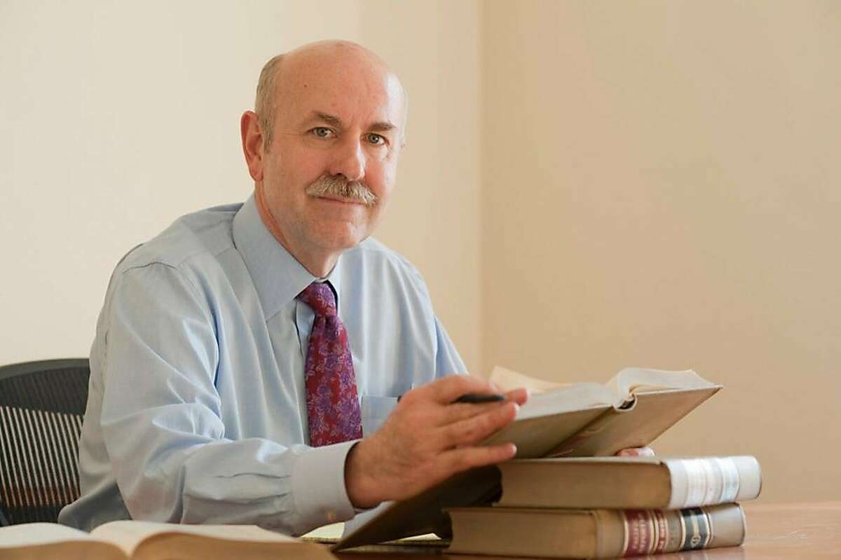 Judge Richard Ulmer in his law library. Photo courtesy of Judge Ulmer campaign