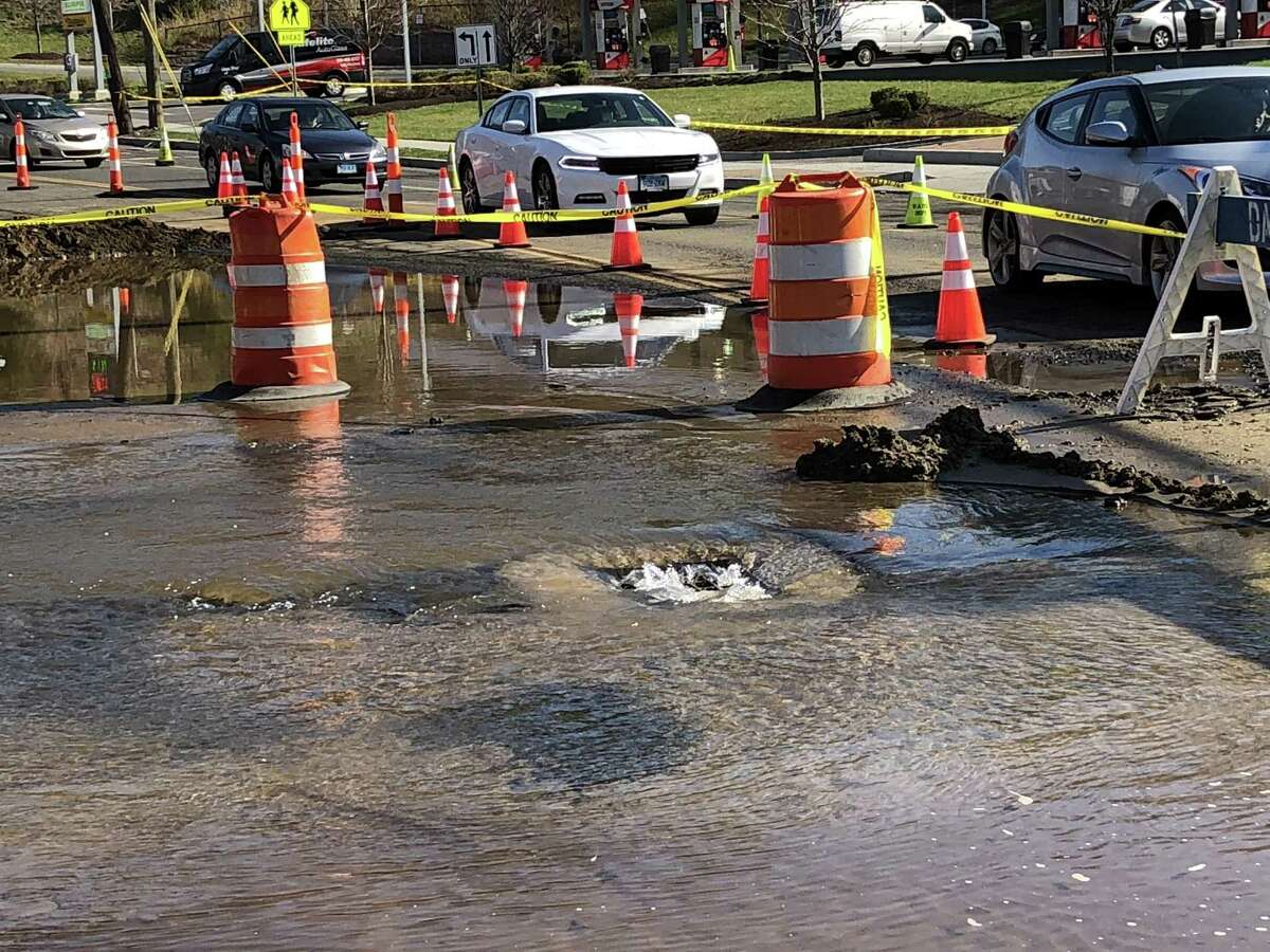 A severe break of a 16-inch water main has put much of Danbury under a water emergency on Tuesday, April 24, 2018. The broken water main is affecting operations at Danbury Hospital, closed two schools and left a third of the city without water or low water pressure. The break on Tamarack Avenue and Hayestown avenues that happened early Tuesday morning is affecting thousands of residents and scores of businesses.