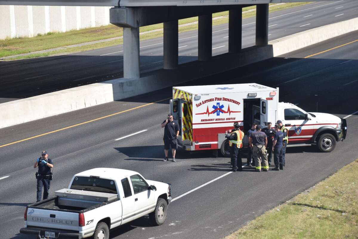 Police divert traffic off of I-35 North near the Loop 410 intersection after a fatal crash involving a pedestrian on April 24, 2018.