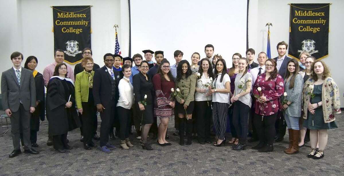 The Middlesex Community College chapter of Phi Theta Kappa, Beta Gamma Xi, inducted 64 new members at the Middletown campus.
