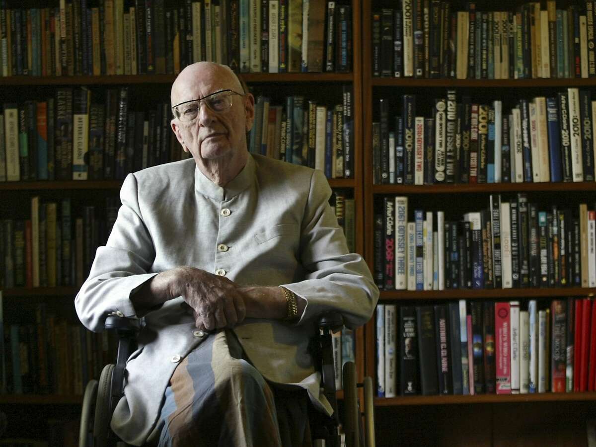 ** FILE ** Science fiction writer, Arthur C. Clarke, poses at his home in Colombo, Sri Lanka, in this May 9, 2007 file photo. Clarke, the author of more than 100 books, including "2001: A Space Odyssey", died early Wednesday, March 19, 2008 after suffering from breathing problems. He was 90. (AP Photo/Gemunu Amarasinghe)