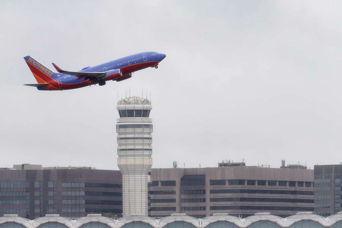 In this Sept. 25, 2014 file photo, a Southwest Airlines jet takes off from Washington's Ronald Reagan National Airport. Southwest Airlines has expressed interest in a nonstop route to Reagan National from San Antonio International Airport.
