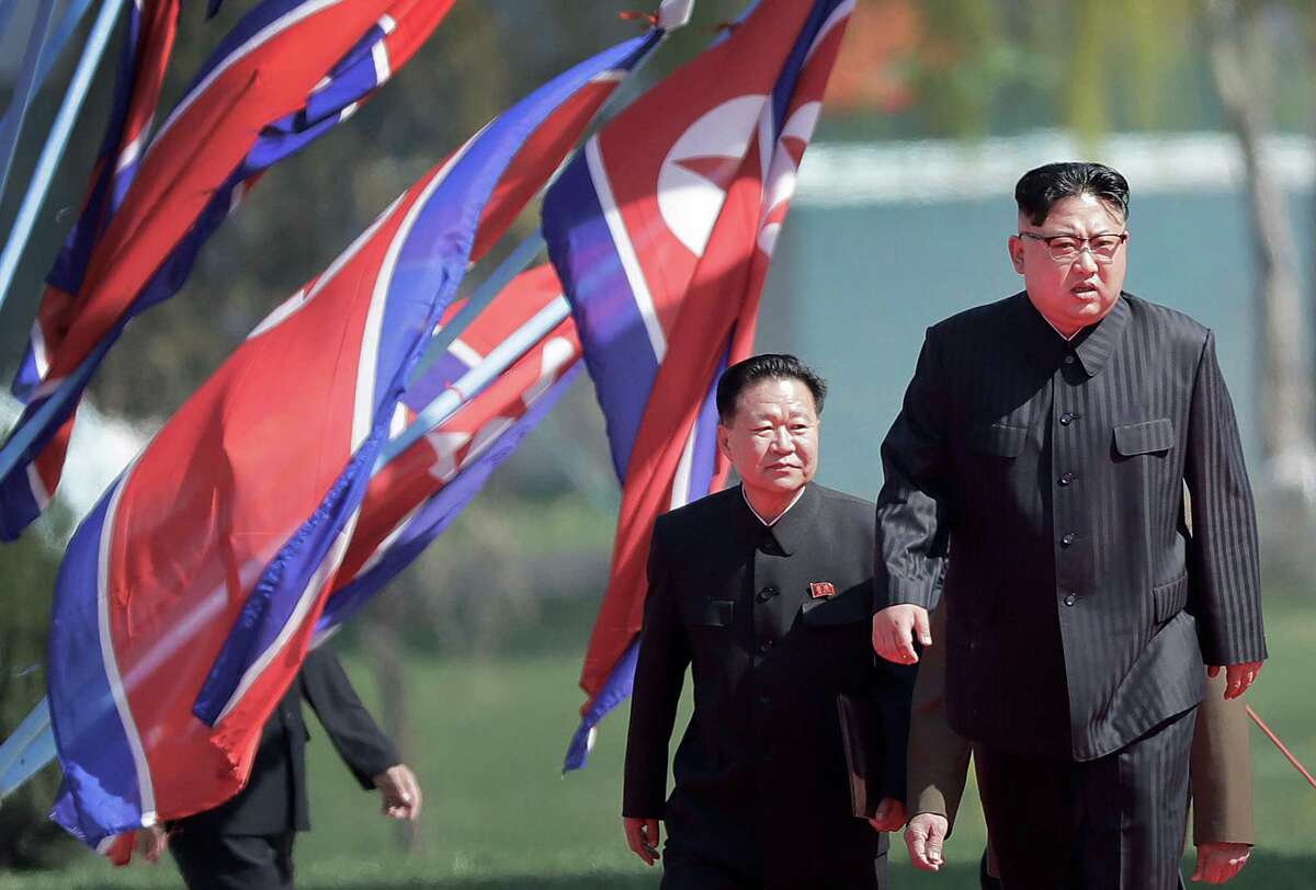Leader Kim Jong Un (right, with Choe Ryong Hae, a vice chairman for the Workers’ Party) says North Korea will stop nuclear and intercontinental ballistic missile tests. However, it did not indicate it will give up its nuclear arsenal or halt its production of missiles.