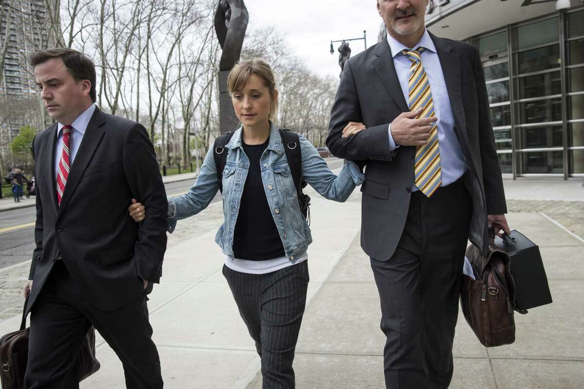 NEW YORK, NY - APRIL 24: Actress Allison Mack leaves U.S. District Court for the Eastern District of New York after a bail hearing, April 24, 2018 in the Brooklyn borough of New York City. Mack was charged last Friday with sex trafficking for her involvement with a self-help organization for women that forced members into sexual acts with their leader. The group, called Nxivm, was led by founder Keith Raniere, who was arrested in March on sex-trafficking charges. She was released on bail at $5 million.