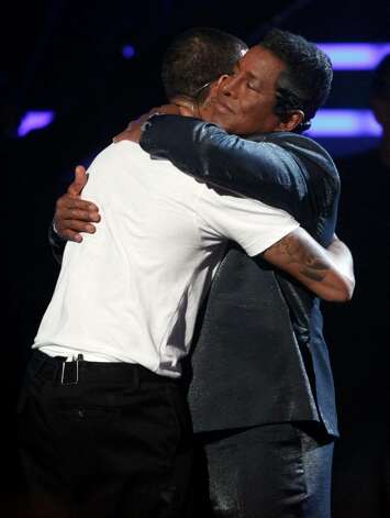 Chris Brown And Jermaine Jackson Hug Onstage At The Bet