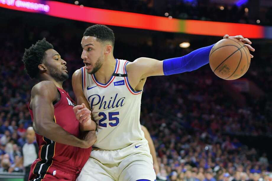 PHILADELPHIA, PA - APRIL 24: Ben Simmons #25 of the Philadelphia 76ers fights off Justise Winslow #20 of the Miami Heat at Wells Fargo Center on April 24, 2018 in Philadelphia, Pennsylvania. (Photo by Drew Hallowell/Getty Images) Photo: Drew Hallowell / 2018 Getty Images