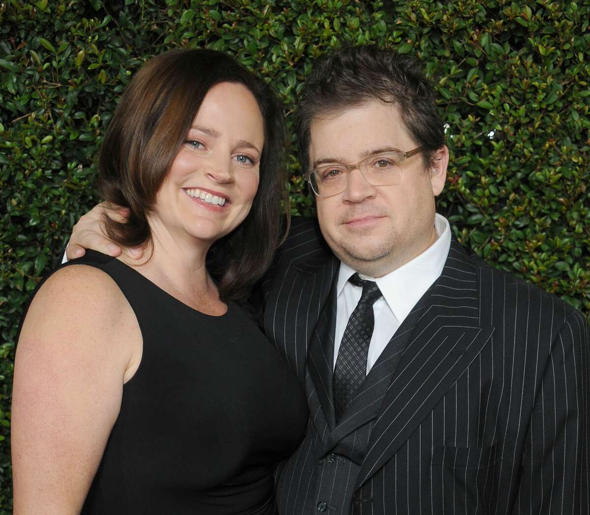 Author Michelle McNamara and her husband actor Patton Oswalt and wife arrive at the "Young Adult" Los Angeles Premiere at AMPAS Samuel Goldwyn Theater on December 15, 2011 in Beverly Hills, California.