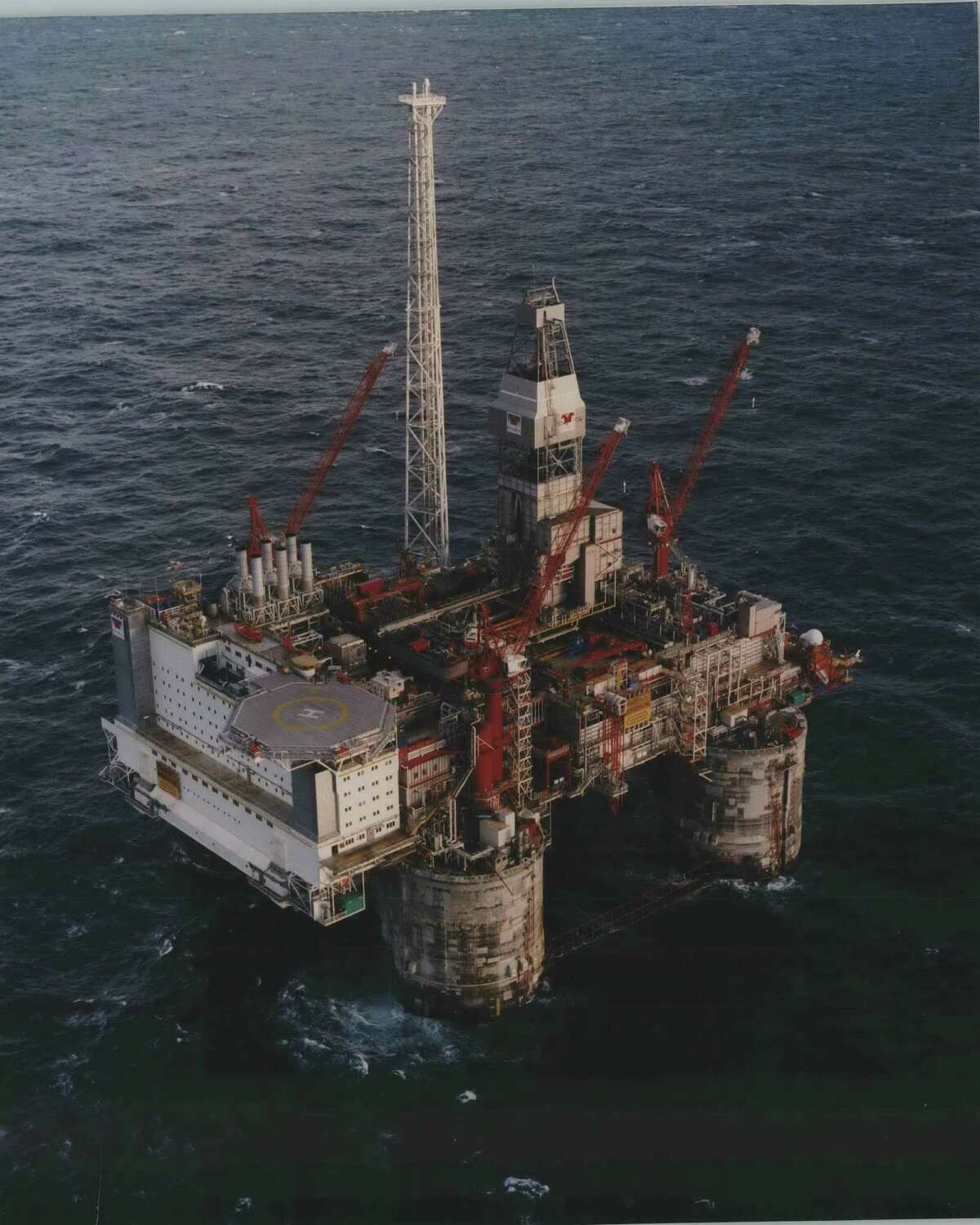 Concrete Evidence - The world's first concrete Tension Leg Platform, developed by Conoco, is producing oil and gas from the Heidrun Field offshore Norway in 1150 feet of water. Located 70 miles south of the Arctic Circle, Heidrun is the world's northernmost offshore developed field. Heidrun platform, located 70 miles south of the Arctic Circle, is the world's first floating production platform made of concrete. Herding Development Project. 00521 14 CN 24.09.95 Heidrun TLP; Heidrun Field, , Jan B's Foto as