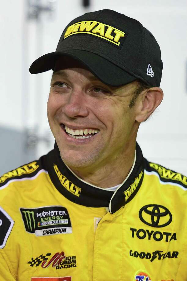 HOMESTEAD, FL - NOVEMBER 17:  Matt Kenseth, driver of the #20 DeWalt Hurricane Relief Toyota, stands on the grid during qualifying for the Monster Energy NASCAR Cup Series Championship Ford EcoBoost 400 at Homestead-Miami Speedway on November 17, 2017 in Homestead, Florida.  (Photo by Jared C. Tilton/Getty Images) ORG XMIT: 691603981 Photo: Jared C. Tilton / 2017 Getty Images