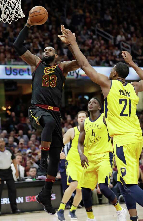 Cleveland Cavaliers' LeBron James (23) drives to the basket against Indiana Pacers' Thaddeus Young (21) in the first half of Game 5 of an NBA basketball first-round playoff series, Wednesday, April 25, 2018, in Cleveland. (AP Photo/Tony Dejak) Photo: Tony Dejak / AP 2018