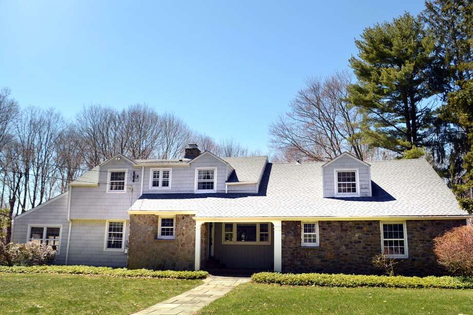 The Cape Cod house at 1265 Daniels Farm Road, built in 1944, is a bit unusual for capes of its era, with all four bedrooms upstairs and a first-floor laundry. The custom-built, 2,489-square-foot home has many of its original features, including hardwood floors and lots of storage space. It also has an unusual amount of open space for the area, sitting on 2.68 acres of property in what is typically a one-acre zone. Photo: Contributed Photo / Contributed Photo / Connecticut Post Contributed