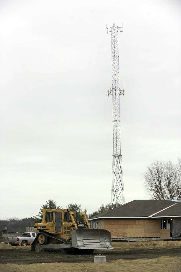 The communication tower can be seen near the new Bethel Police Station which is under construction Friday, Dec. 22, 2017. Crews are about halfway finished with the new Bethel police station. The 26,000-square-foot station is budgeted at $13.5 million. Photo: Carol Kaliff / Hearst Connecticut Media / The News-Times