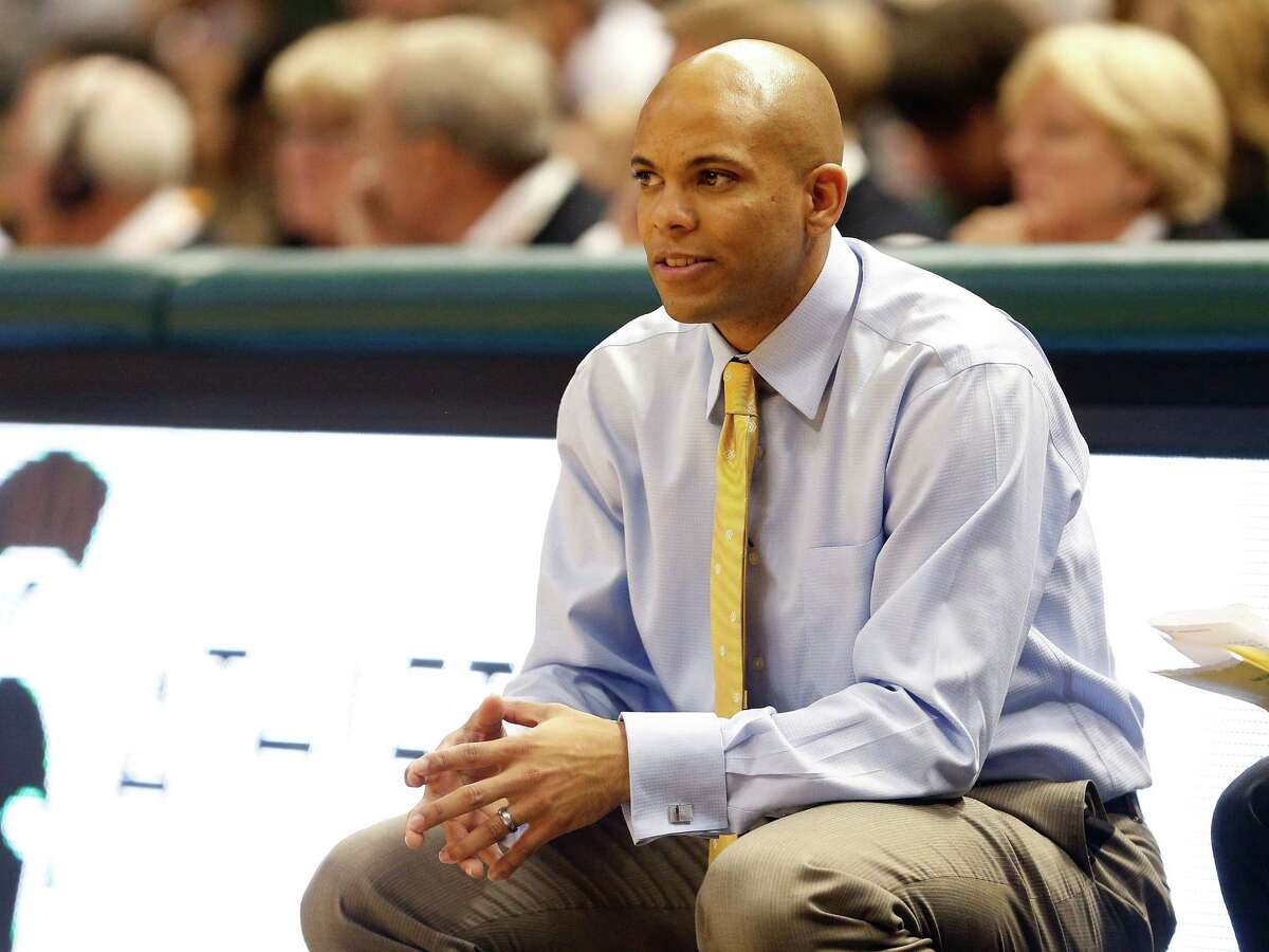 EAST LANSING, MI - NOVEMBER 29: Head coach Jamion Christian of the Mount St. Mary's Mountaineers look on during the second half while playing the Michigan State Spartans at the Jack T. Breslin Student Events Center on November 29, 2013 in East Lansing, Michigan. Michigan State won the game 98-65. (Photo by Gregory Shamus/Getty Images) ORG XMIT: 185392817