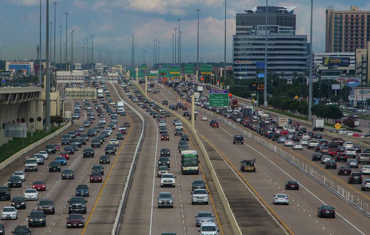 Lanes of Interstate 10, with the Katy Managed Lanes in the center, stretch out looking east toward downtown from the entrance ramp to the southbound Sam Houston Tollway on July 19, 2017.