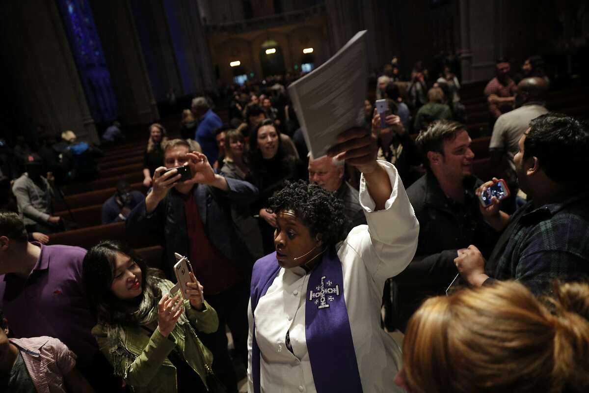 The Rev. Yolanda Norton (center), of the San Francisco Theological Seminary, dances with congregants at Grace Cathedral to celebrate the Beyonce Mass on Wednesday, April 25, 2017 in San Francisco, Calif.
