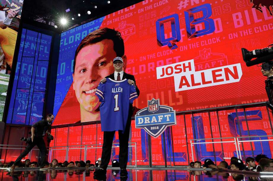 Wyoming's Josh Allen poses with his Buffalo Bills jersey during the first round of the NFL football draft, Thursday, April 26, 2018, in Arlington, Texas. (AP Photo/David J. Phillip) Photo: David J. Phillip / Associated Press