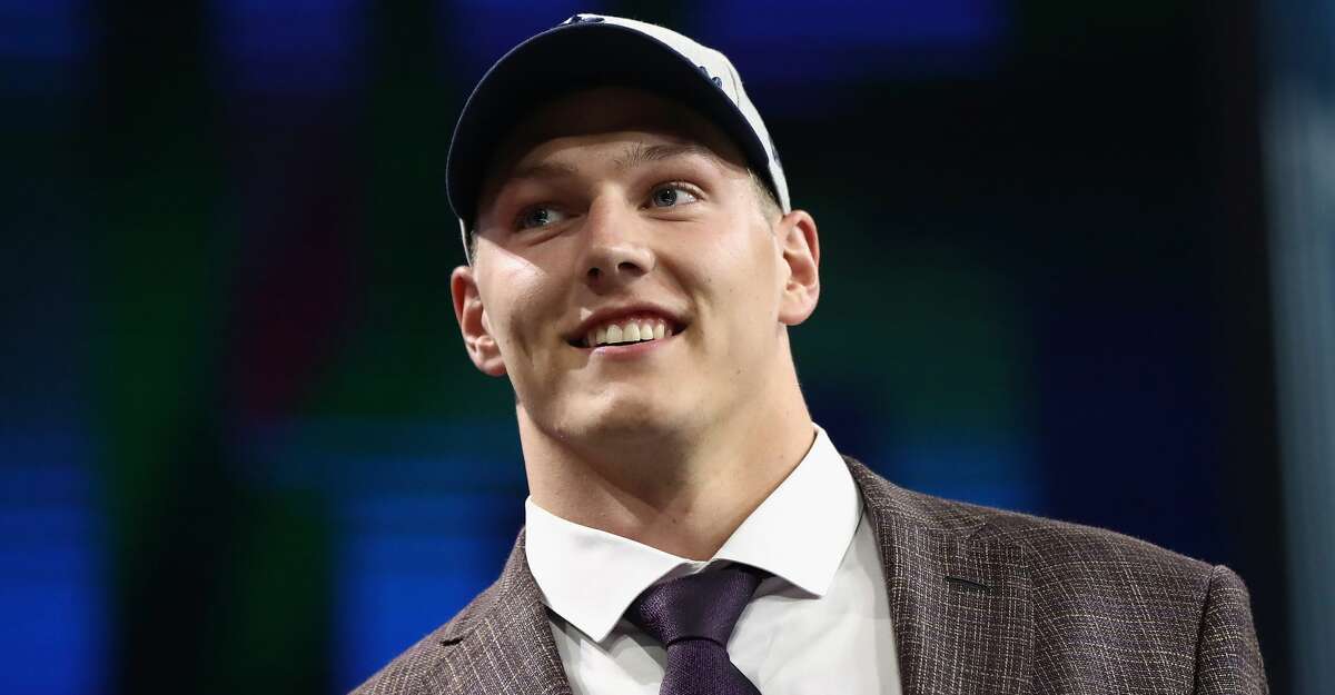 ARLINGTON, TX - APRIL 26: Leighton Vander Esch of Boise State reacts after being picked #19 overall by the Dallas Cowboys during the first round of the 2018 NFL Draft at AT&T Stadium on April 26, 2018 in Arlington, Texas. (Photo by Ronald Martinez/Getty Images)
