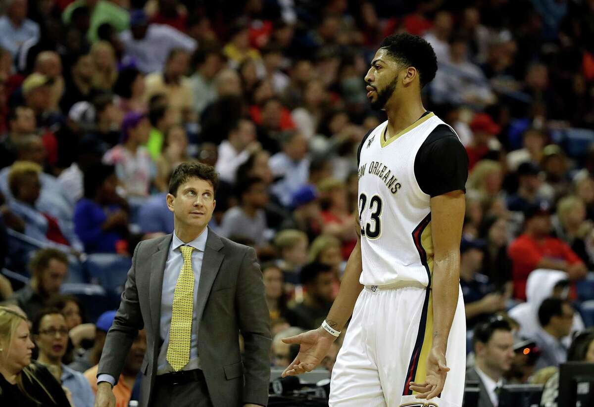 Associate head coach Darren Erman talks with Anthony Davis #23 of the New Orleans Pelicans during the second half of a game against the LA Clippers at the Smoothie King Center on December 28, 2016 in New Orleans, Louisiana. New Orleans won the game 102-98.