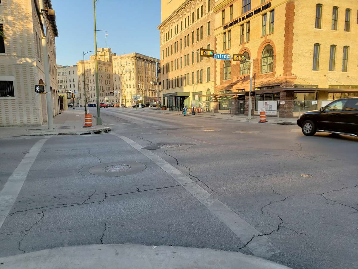 Before: Downtown streets are typically quiet during a regular work day, but are brought to life for the Battle of Flowers parade as thousands of locals take over the streets in the annual San Antonio tradition.