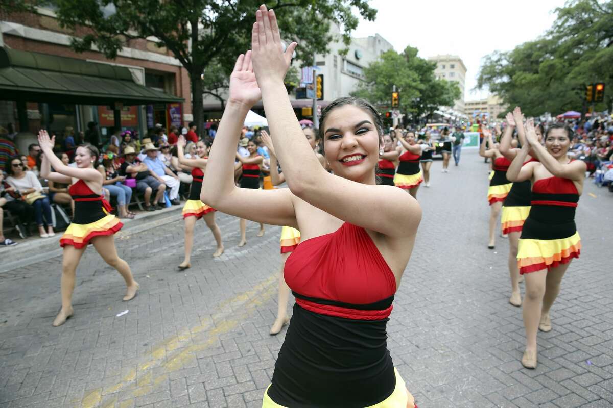 Haley Smith marches with the Southwest Dragons during the Battle of Flowers Parade in Alamo Plaza on April 27, 2018.