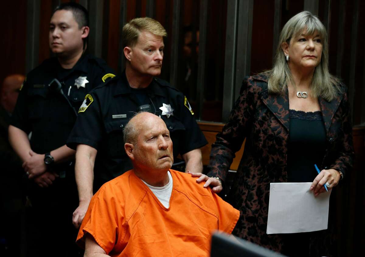 Joseph DeAngelo appears in a Sacramento County courtroom with his public defender Diane Howard for his arraignment on multiple rape and murder charges in Sacramento, Calif. on Friday, April 27, 2018. Authorities believe DeAngelo is the East Area Rapist and Golden State Killer who committed numerous crimes from 1976 to 1986.