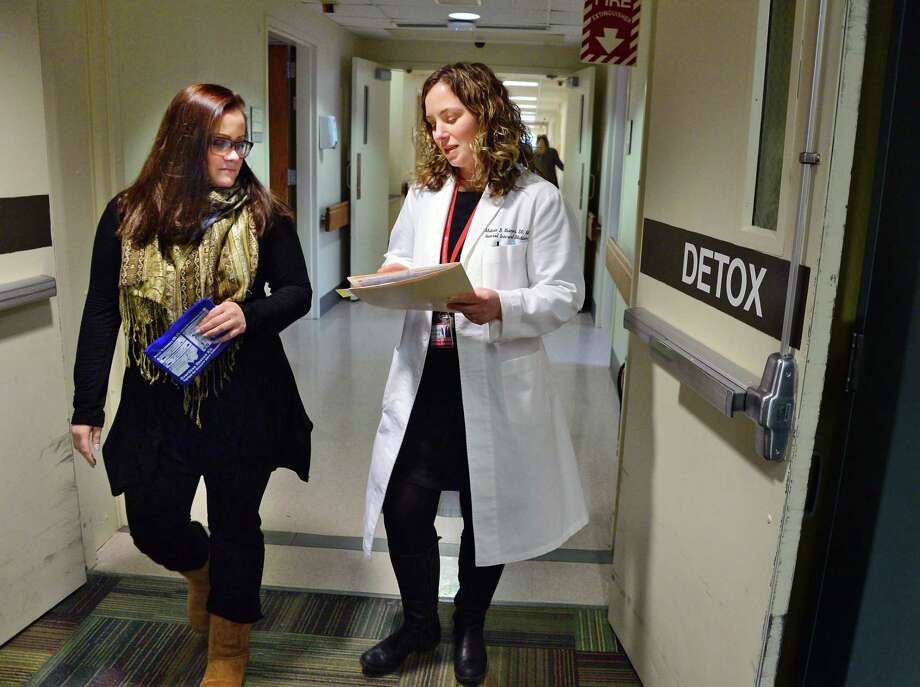Dr. Melissa Weimer, right, consults with outreach specialist Megan Mulholland in the new ambulatory detox program at St. Peters Hospital Thursday Feb. 1, 2018 in Albany, NY. Photo: John Carl D'Annibale / 20042799A