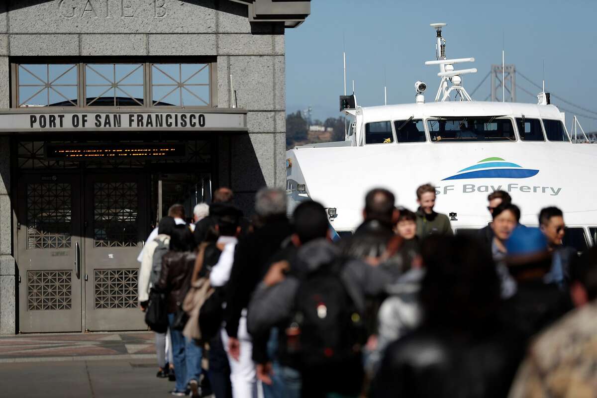 Passengers line up to board the ferry to Vallejo from the Ferry Building, in San Francisco, Calif., on Thursday, April 26, 2018. Commuting by ferry remains popular and often crowded during heavy commute hours.