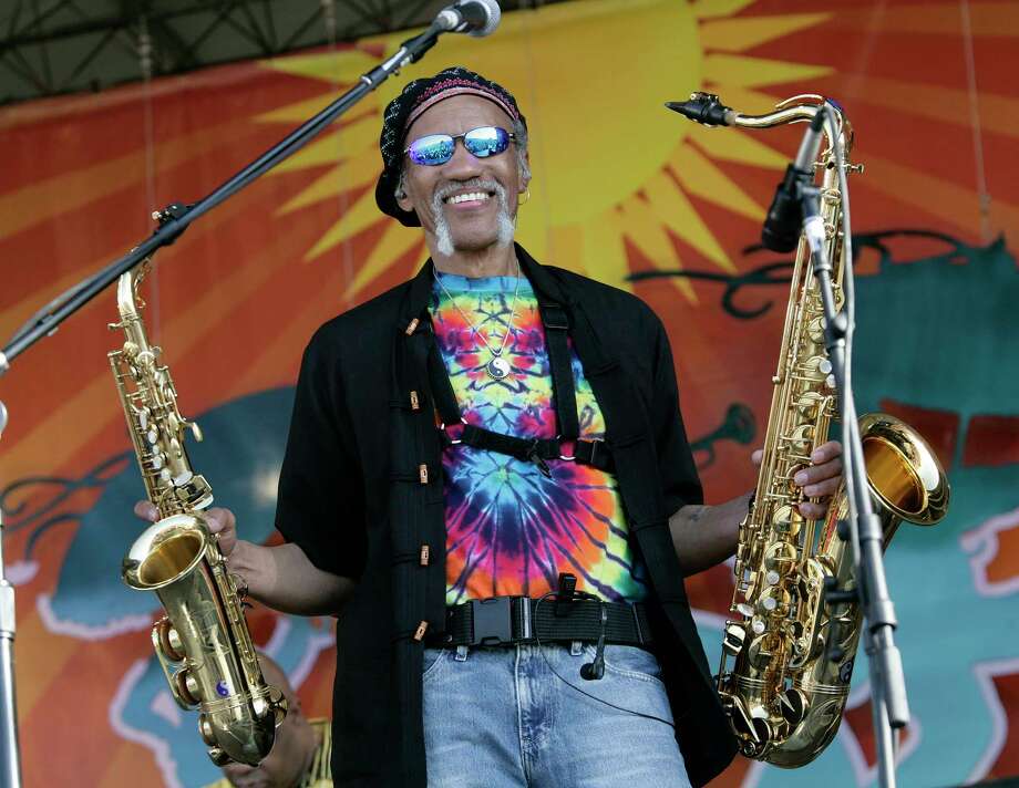 FILE - In a May 4, 2008 file photo, Charles Neville arrives with The Neville Brothers on stage to perform during the 2008 New Orleans Jazz & Heritage Festival at the New Orleans Fairgrounds Racetrack in New Orleans. New Orleans-born saxophone player Charles Neville has died at age 79. A publicist for Aaron Nevilles management agency confirmed the death in an email.  (AP Photo/Dave Martin, File) Photo: Dave Martin / AP2008
