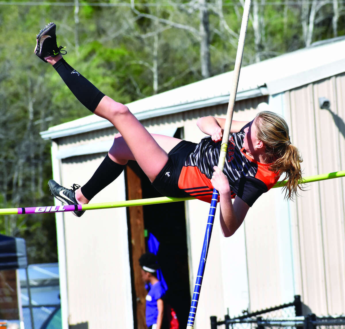 Edwardsville’s Emma Herman competes in the pole vault during the Collinsville Invitational on Friday.