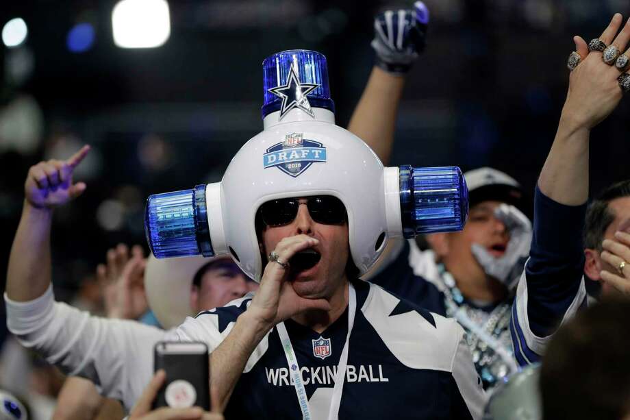 Dallas Cowboys fans cheer during the second round of the NFL football draft Friday, April 27, 2018, in Arlington, Texas. (AP Photo/Eric Gay) Photo: Eric Gay / Copyright 2018 The Associated Press. All rights reserved.