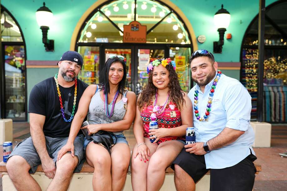 photos: fiesta crowds pack market squares free party