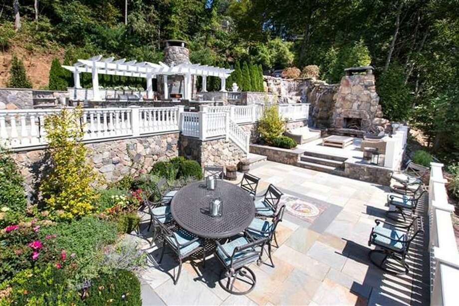 The outdoor patio and kitcken constructed on a lakeside New Fairfield home by celebrity chef Donatella Arpaia that officials with Firstlight say was built illegally. The state Supreme Court on Friday upheld previous decisions that most of the structures should be removed. Photo: / Contributed
