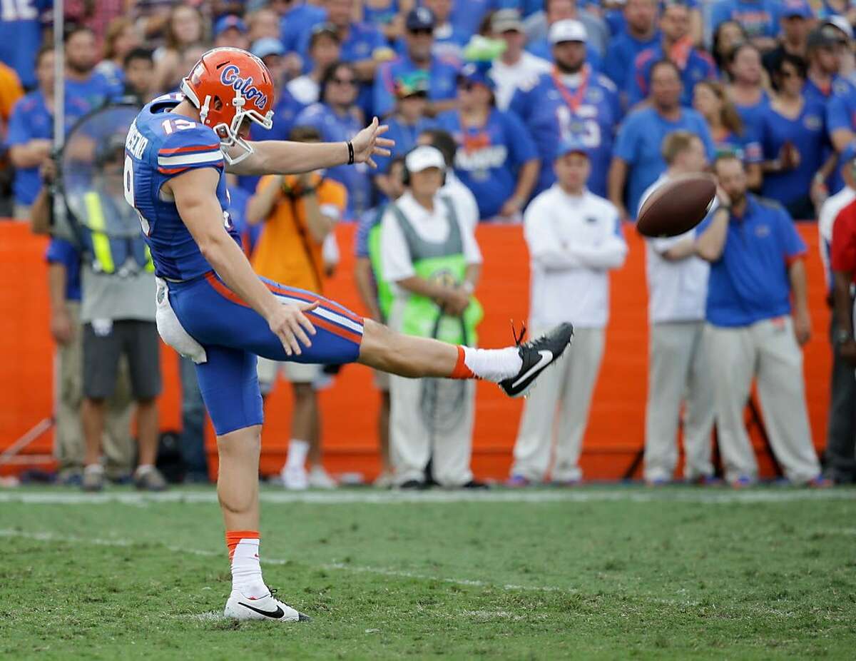 FILE - In this Sept. 26, 2015, file photo, Florida punter Johnny Townsend kicks against Tennessee during the second half of an NCAA college football game, in Gainesville, Fla. Florida kicker Eddy Pineiro and punter Johnny Townsend are looking to become the first specialists drafted from the same team in the same year since 1985. (AP Photo/John Raoux, File)