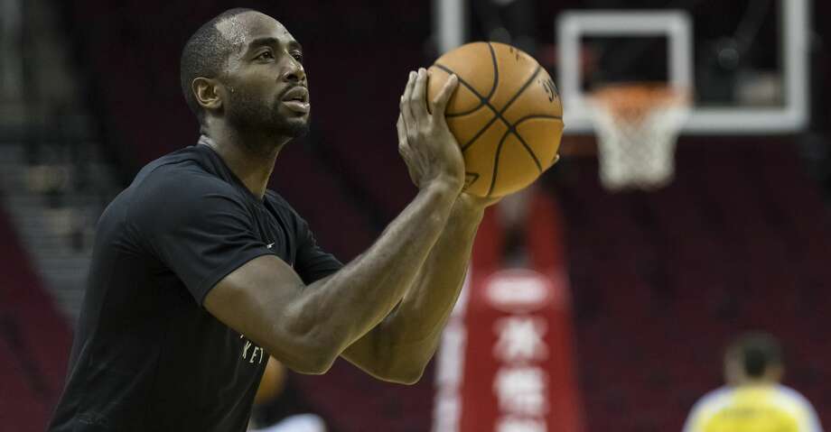 HOUSTON, TX - FEBRUARY 09:  Luc Mbah a Moute #12 of the Houston Rockets takes a shot before the game against the Denver Nuggets at Toyota Center on February 9, 2018 in Houston, Texas.  NOTE TO USER: User expressly acknowledges and agrees that, by downloading and or using this Photograph, user is consenting to the terms and conditions of the Getty Images License Agreement.  (Photo by Tim Warner/Getty Images) Photo: Tim Warner/Getty Images