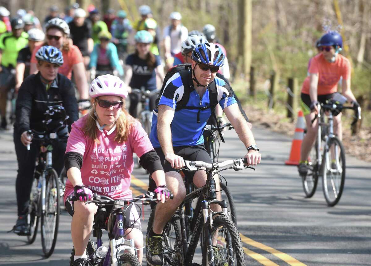 Riders begin the 10th Annual Rock to Rock Earth Day Ride at Common Ground High School near the bottom of West Rock Park in New Haven on April 28, 2018.