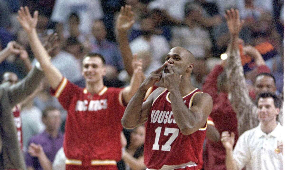Mario Elie blows what became known as the ‘Kiss of Death’ to Phoenix after his 3-pointer in Game 7 in 1995.