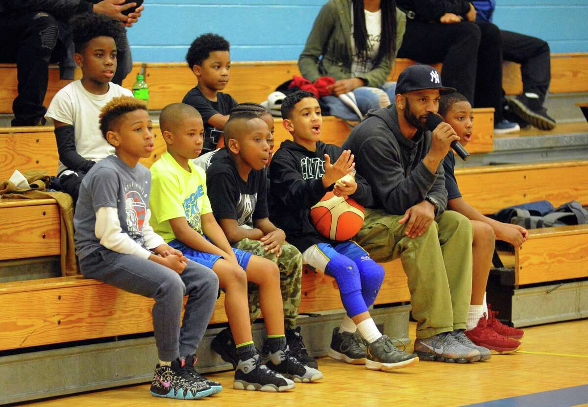 Bridgeport cops, youth team up for basketball game