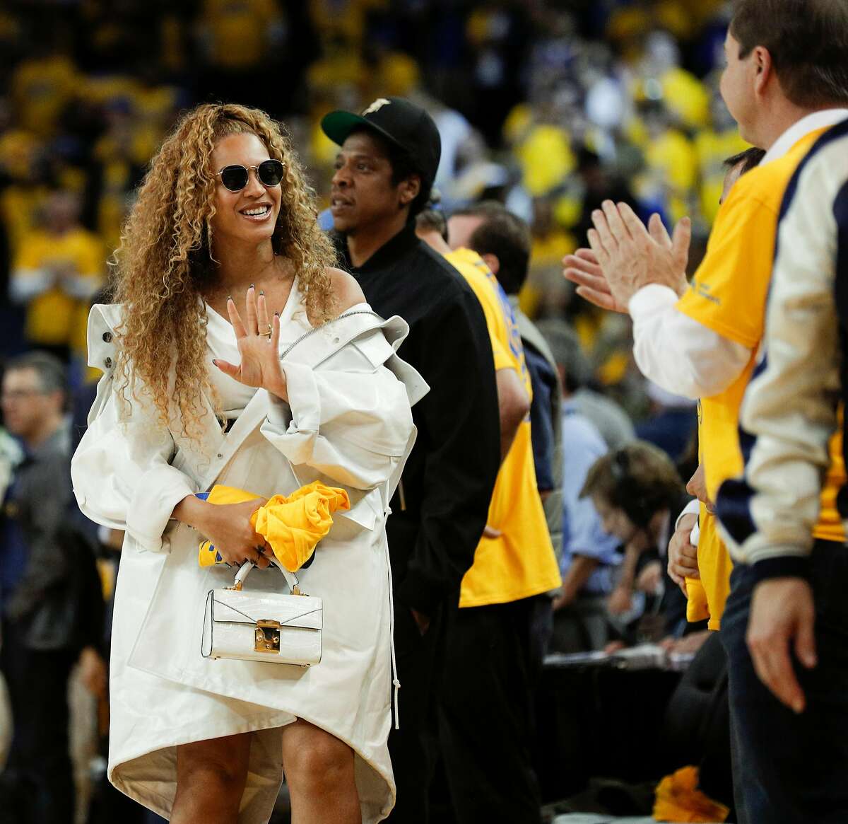 Beyonce waves good-bye to Joe Lacob in the fourth quarter during game 1 of round 2 of the Western Conference Finals between the Golden State Warriors and the New Orleans Pelicans at Oracle Arena on Saturday, April 28, 2018 in Oakland, Calif.
