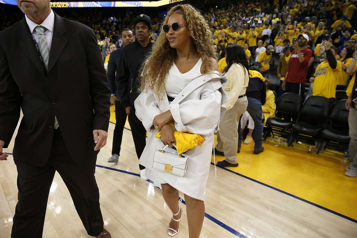 Beyonce and Jay-Z exit following the end of Round 2 Game 1 of the NBA Western Conference Finals between the Golden State Warriors and New Orleans Pelicans at Oracle Arena Saturday, April 28, 2018, in Oakland, Calif.