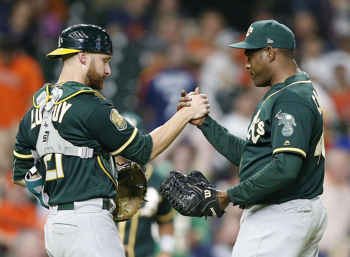 Oakland Athletics pitcher Lou Trivino pitching during the ninth