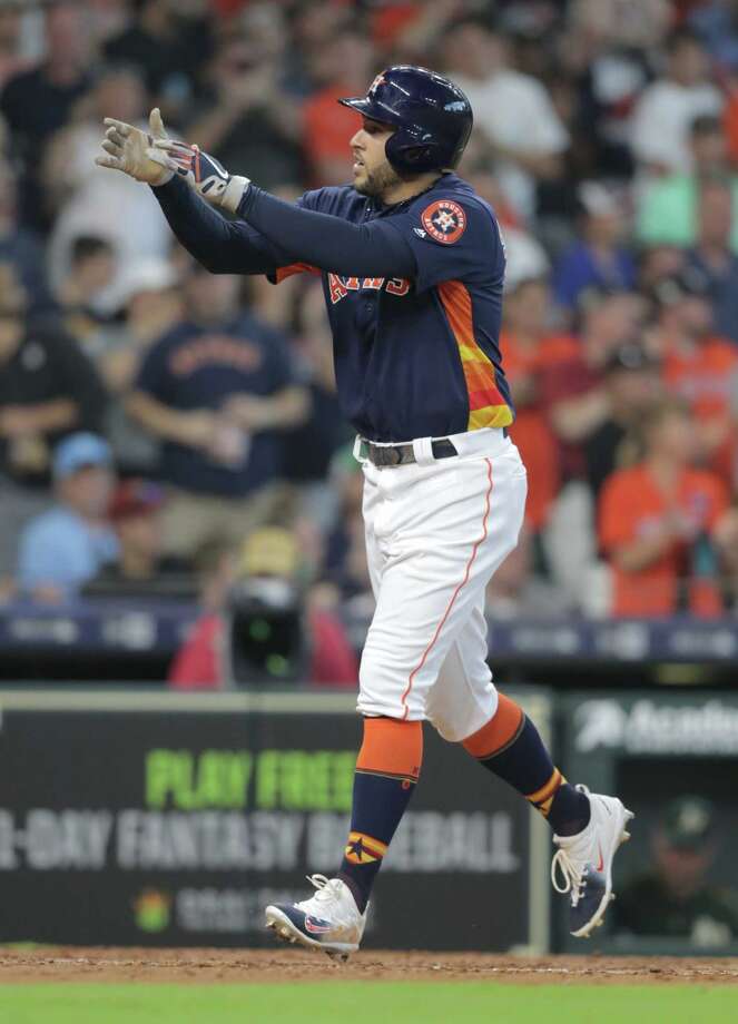 houston astros center fielder george springer (4) reacts after